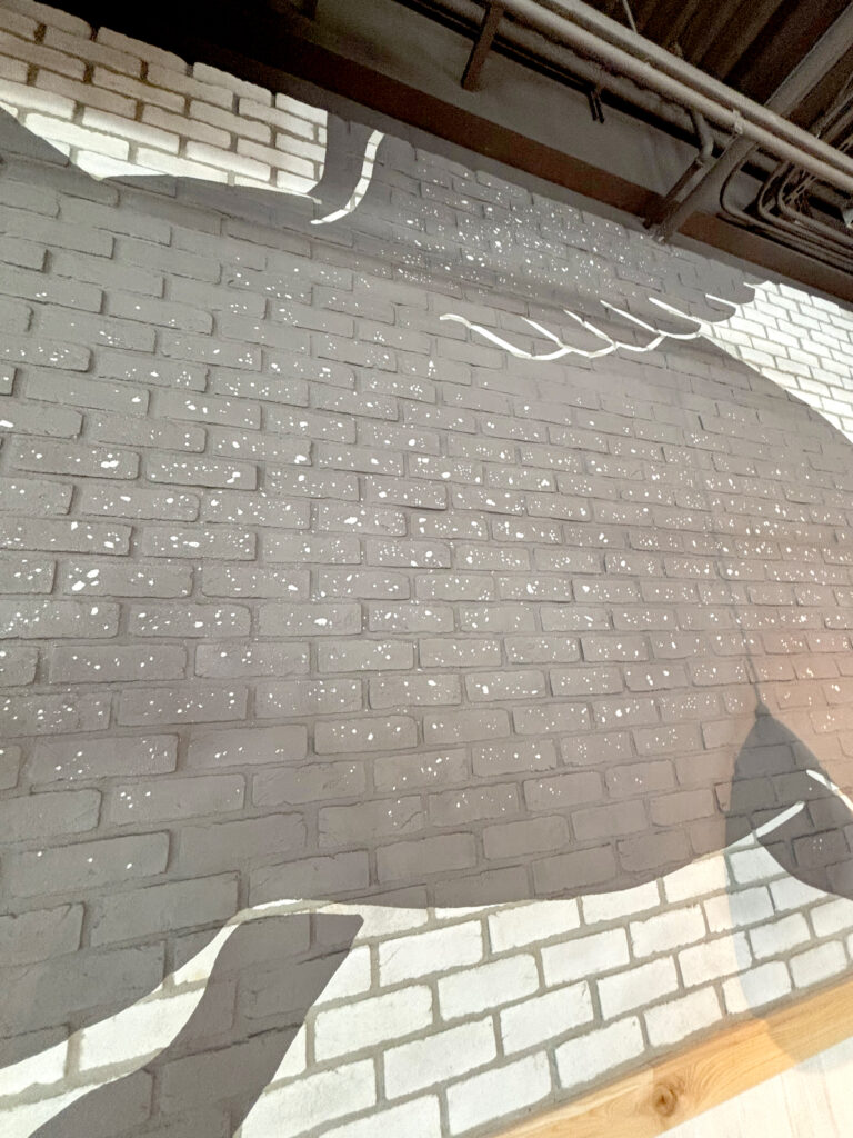 SKIP A Pivotal Character Artworks Painting Sign 4Rivers Smokehouse BBQ Mission Hand Painted Restaurant Middleton Villages Florida Orlando Signage Mural Logo Winter Park Orlando Gym Signage Mural muralist Florida Street Art Fabrication Signage Graffiti Painting SEESKIP Charity Public Art Hire Professional Nashville Miami Tampa St Petersburg Artist Hire